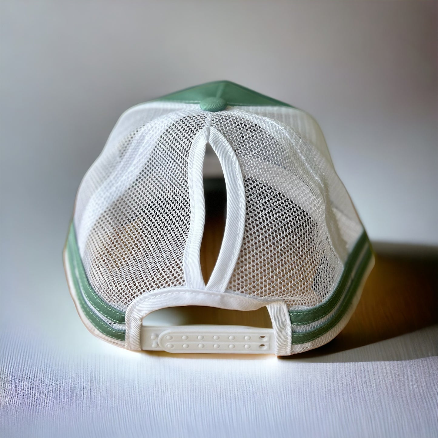 Women’s teal trucker cap