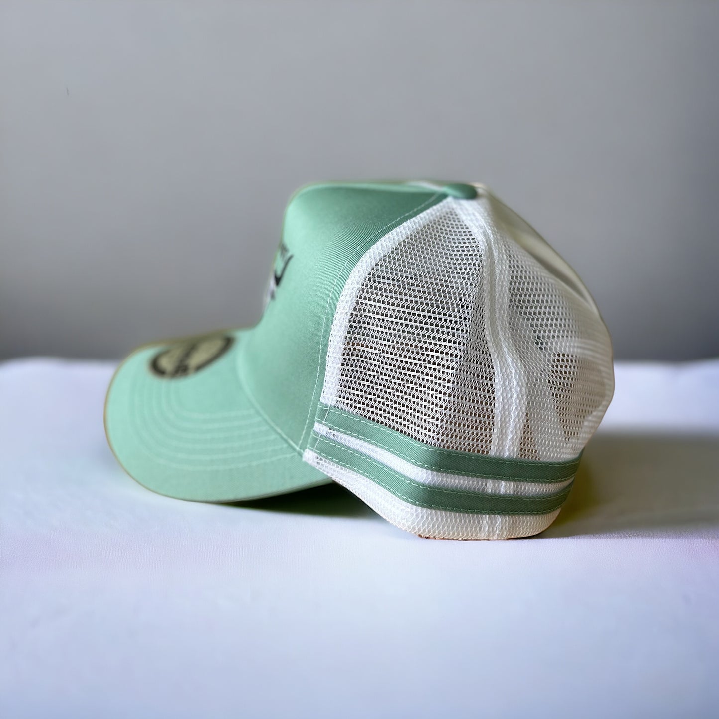 Women’s teal trucker cap